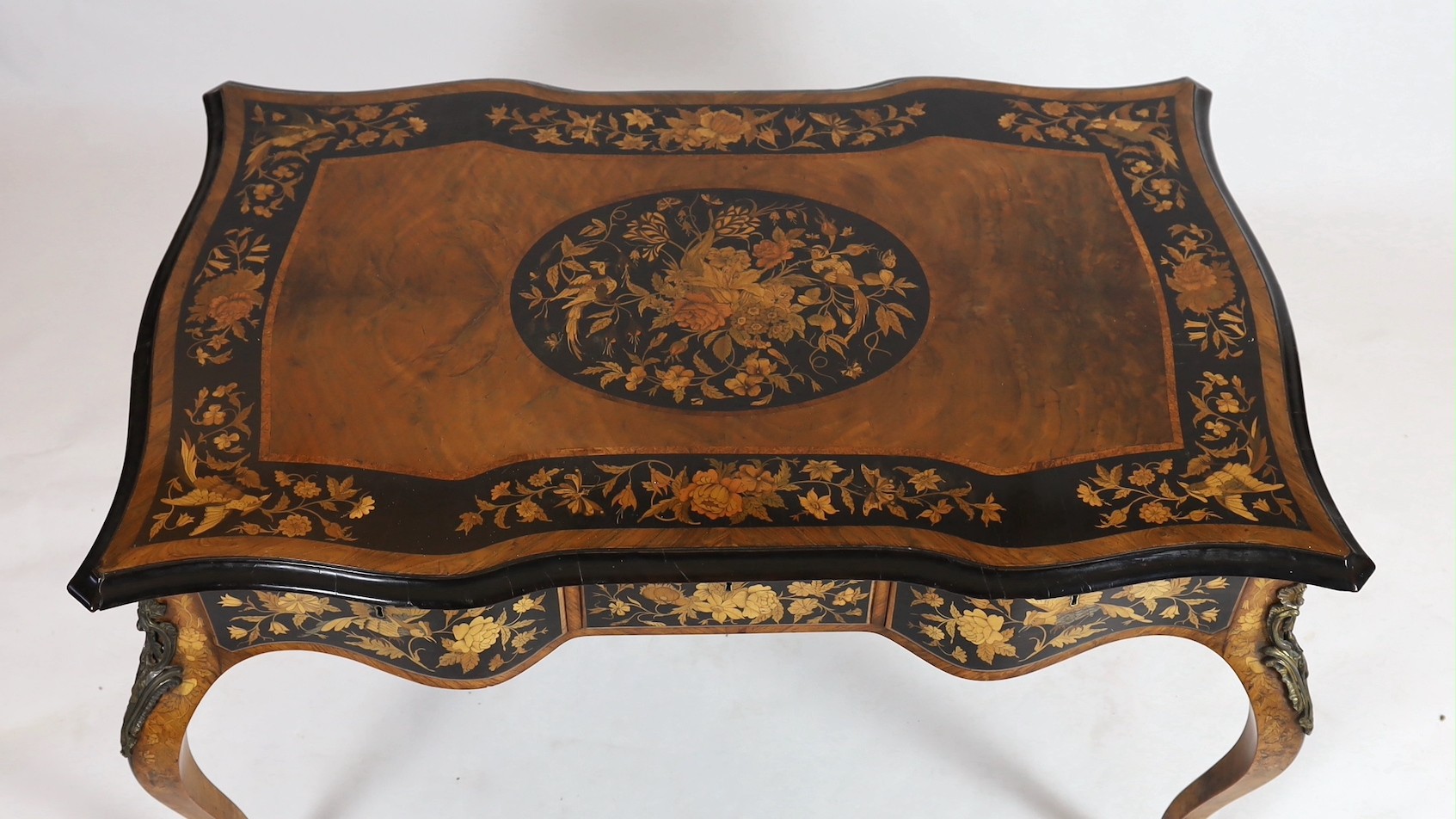 A 19th century Dutch floral marquetry bureau plat, width 126cm, depth 80cm, height 75cm
